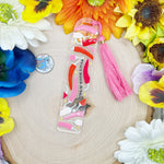Spicy Book Junkie acrylic bookmark with pink tassel