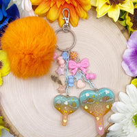 OOAK Lazy Egg Resin Lollipop Keychain with Orange Pom Pom