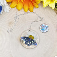 White Daisy Calleta Moth Resin Necklace on a 24-inch Sterling Silver Chain