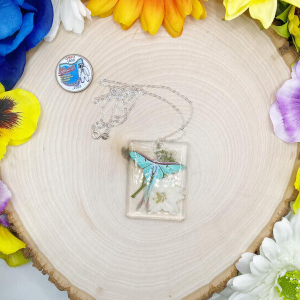 White Floral Chinese Moon Moth Resin Necklace on a 24-inch Sterling Silver Chain